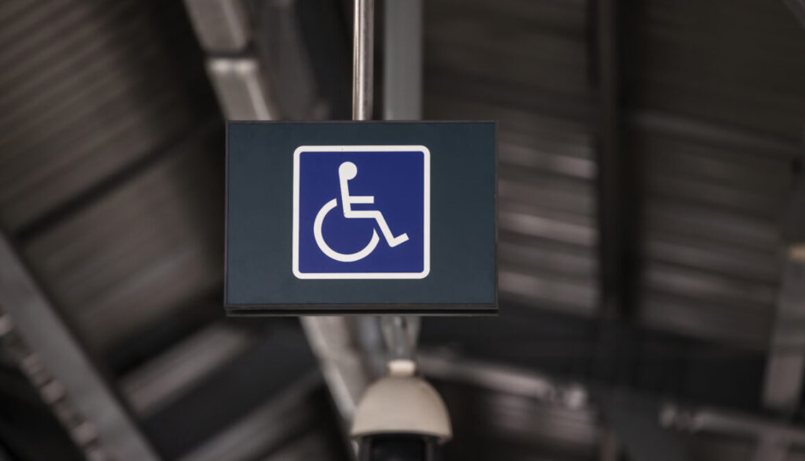 Accessible Elevator with sign. Disabled persons lift near modern